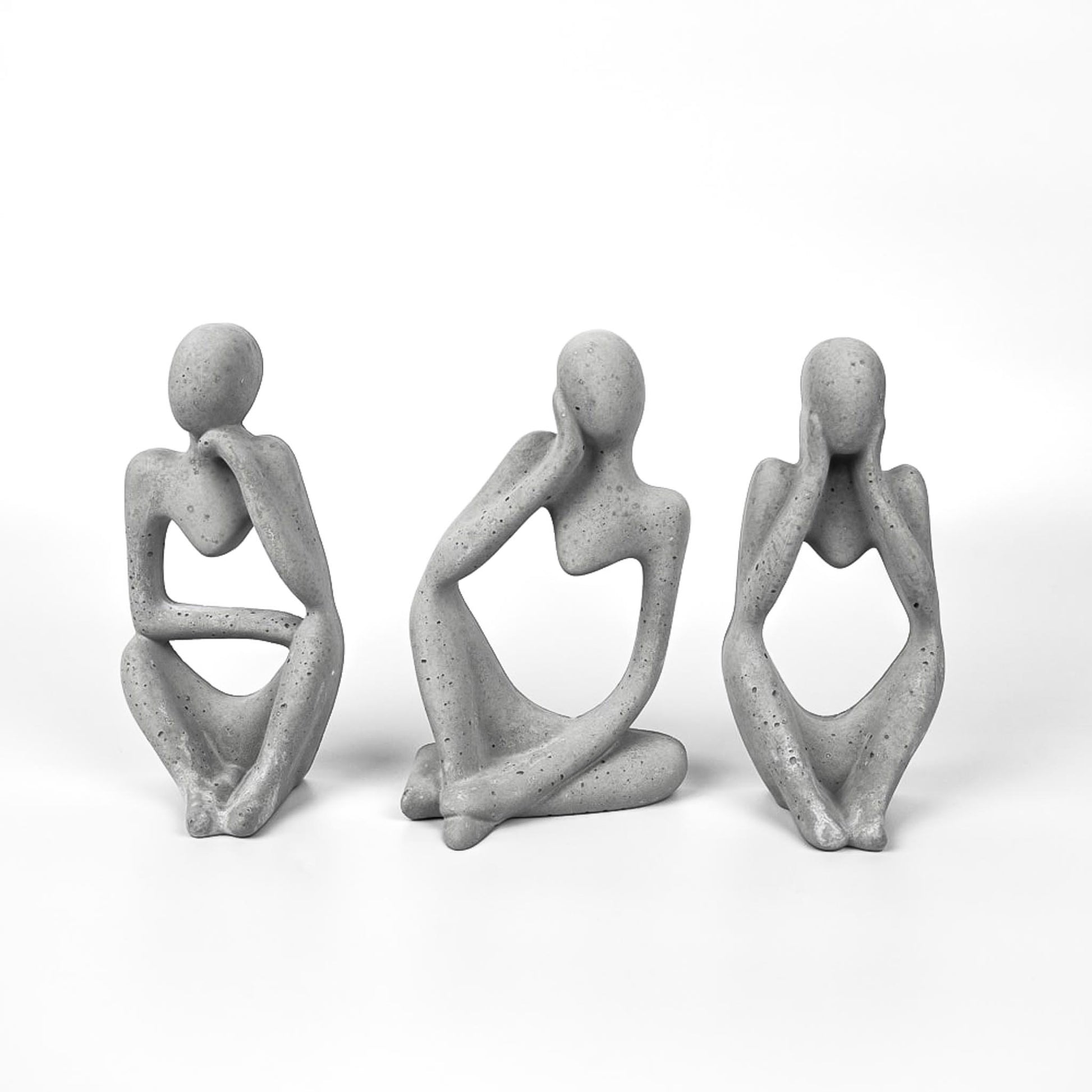 skulpturen-aus-beton-trio-beton-figuren